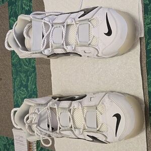 Nike Air Tennis shoes White and black.